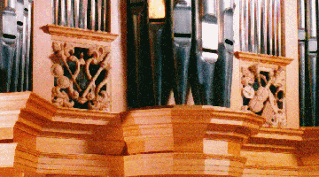 Carved wood instruments, harp, violin, horn & drum. Grace Lutheran Church, Tacoma, WA